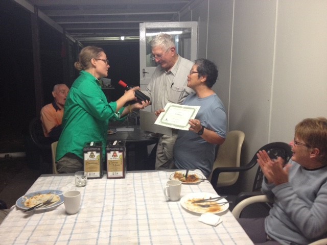 John and Sue receiving their certificate of appreciation, and a nice bottle of Shiraz